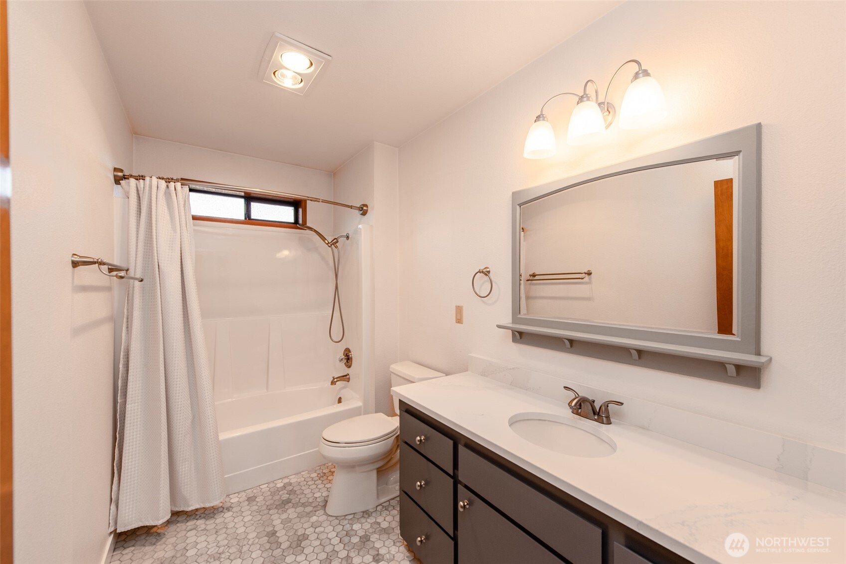 151 Nicole Place Sequim, WA 98382 - Photo 28 of 40 a bathroom with a sink a toilet and shower