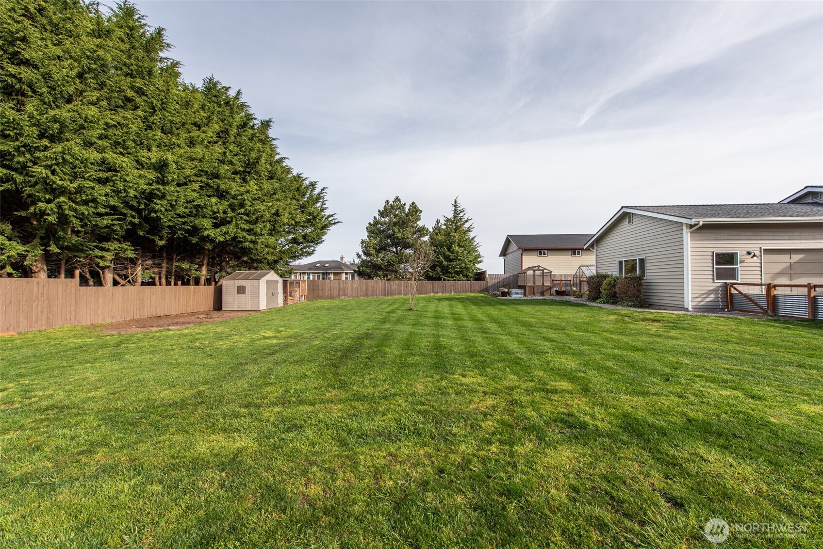 151 Nicole Place Sequim, WA 98382 - Photo 36 of 40 a front view of a house with garden