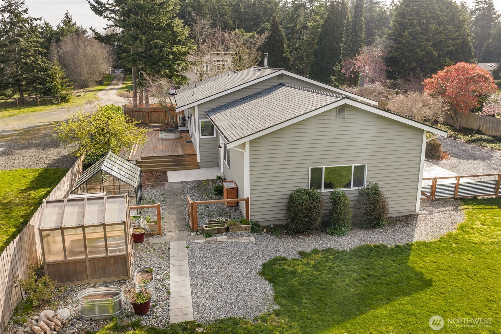 151 Nicole Place Sequim, WA 98382 - Photo 39 of 40 a front view of a house with garden