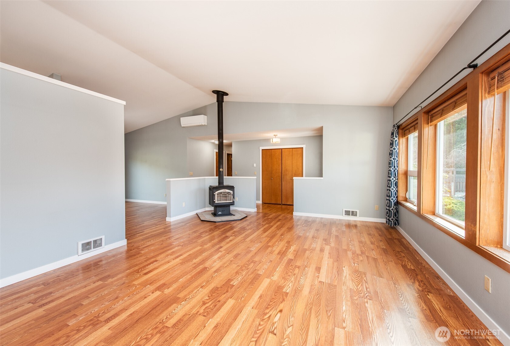 151 Nicole Place Sequim, WA 98382 - Photo 9 of 40 a view of empty room with wooden floor and fan
