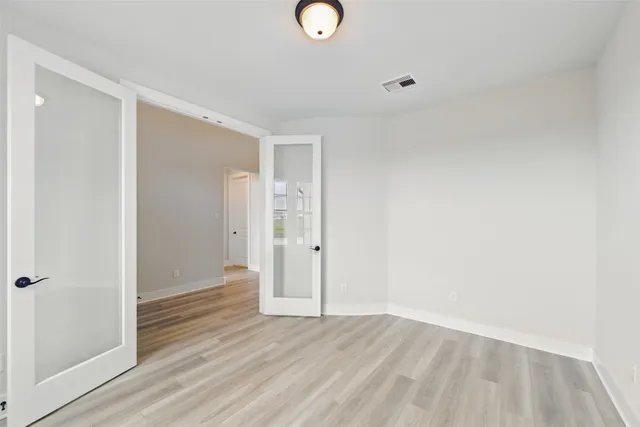 a view of a livingroom with wooden floor