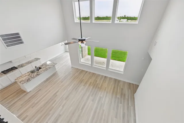 a view of an empty room and window