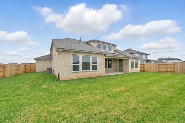 a view of a yard in front of a house