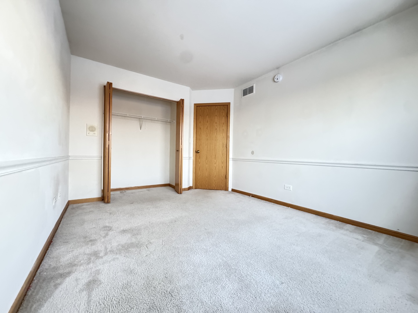 1606 Donegal Drive Minooka, IL 60447 - Photo 12 of 17 an empty room with an entryway