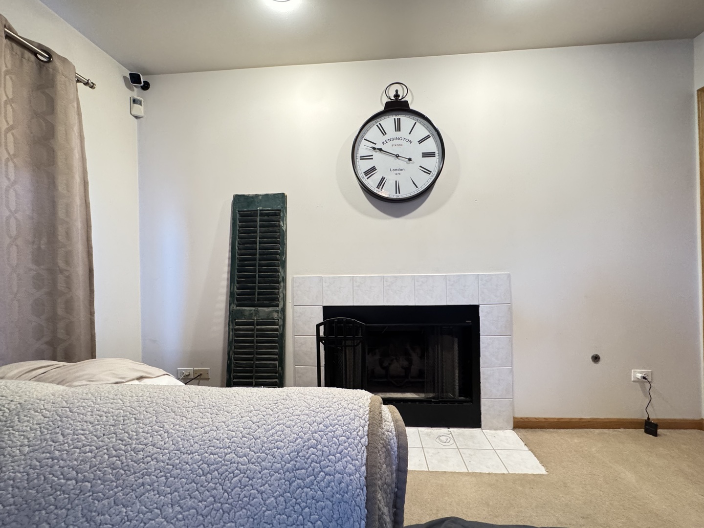 1606 Donegal Drive Minooka, IL 60447 - Photo 6 of 17 a bedroom with a bed and a fireplace