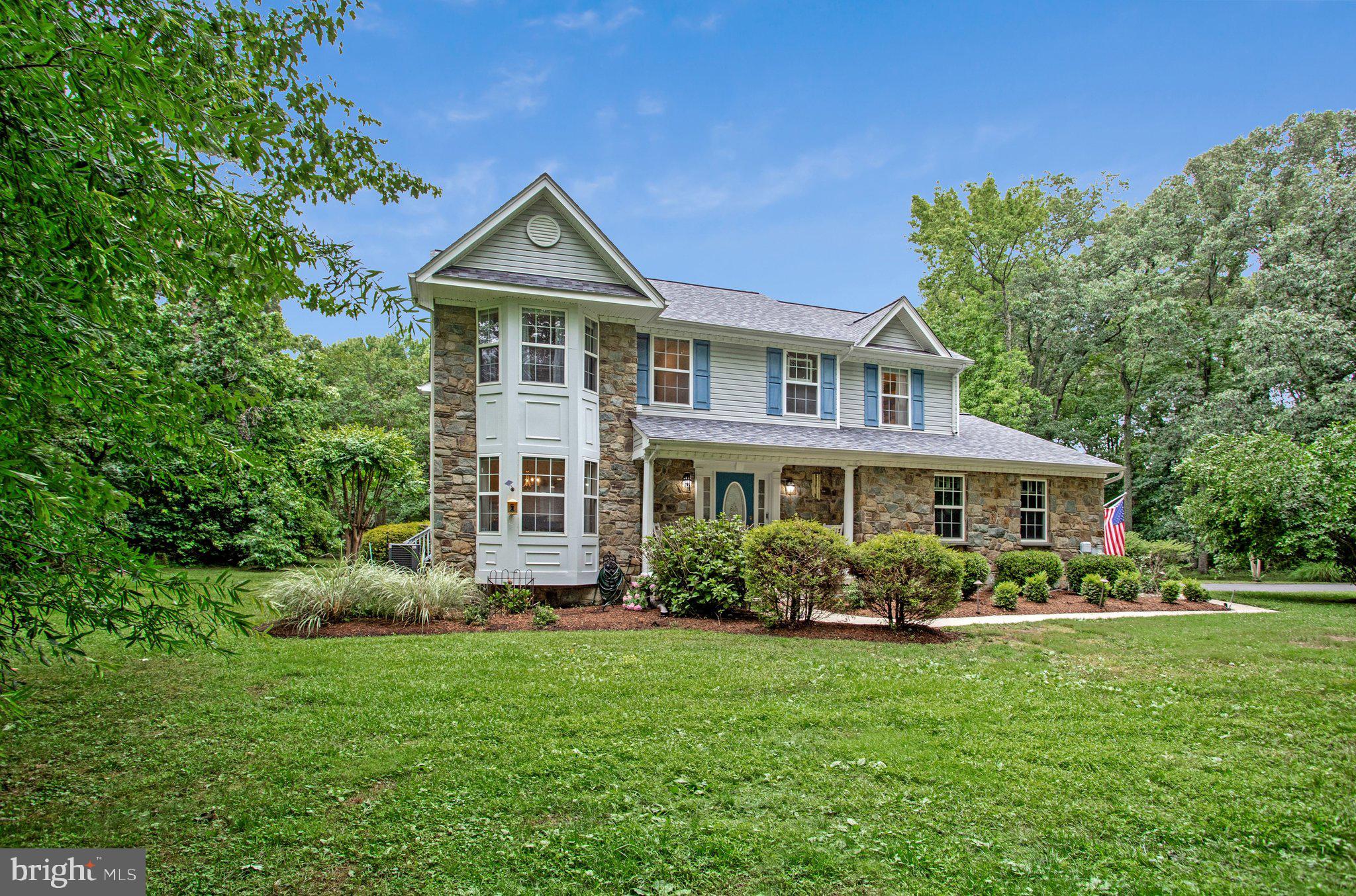 1582 Snug Harbor Road Shady Side, MD 20764 - Photo 2 of 53 Charming home with lush greenery.
