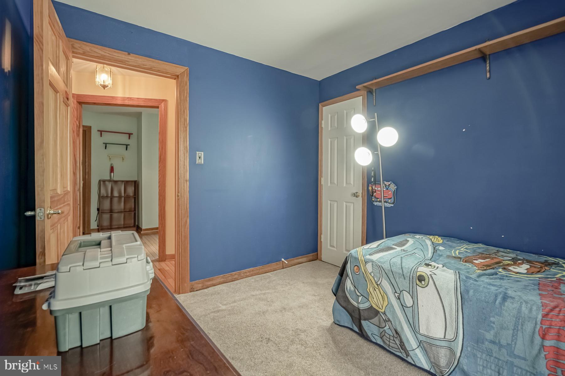 329 Lakedale Road Berlin, NJ 08009 - Photo 11 of 63 a bedroom with a bed and a mirror