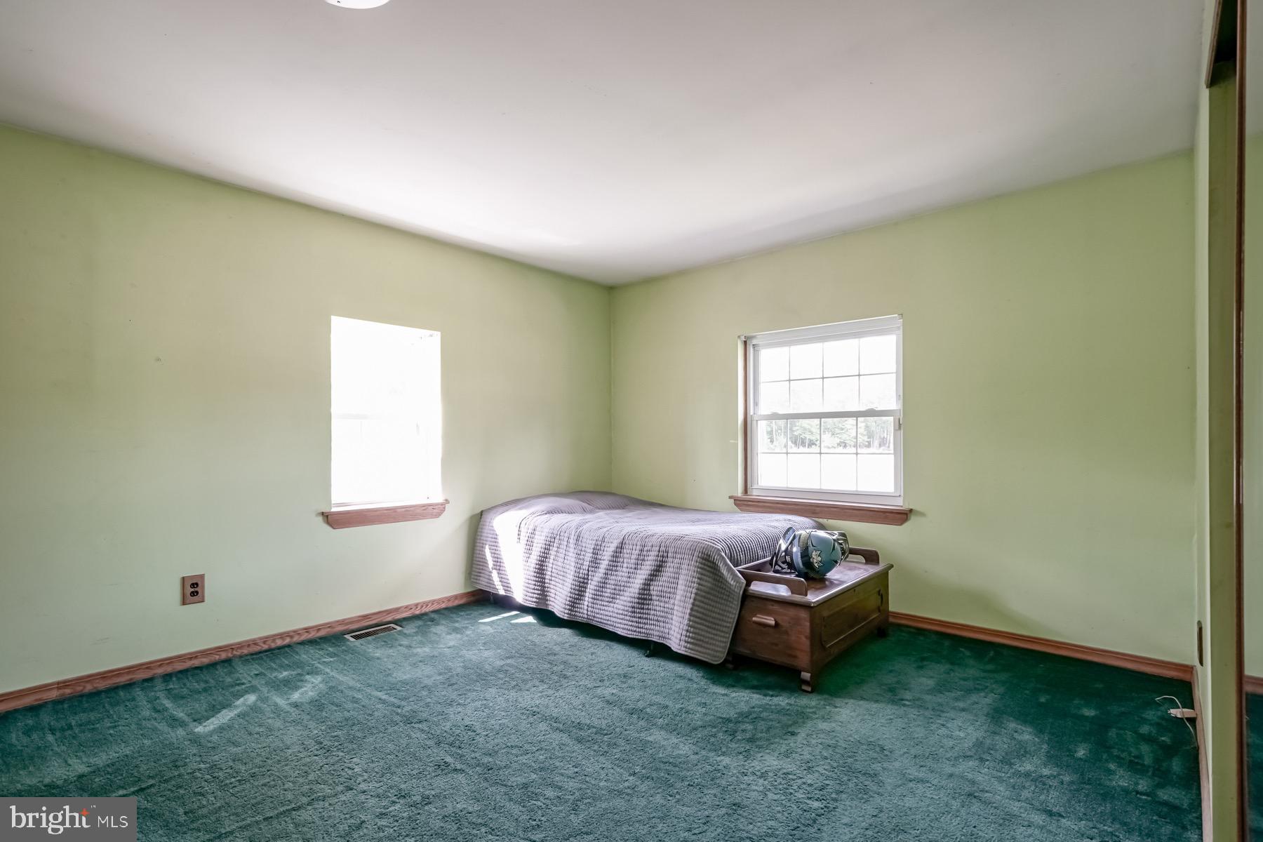 329 Lakedale Road Berlin, NJ 08009 - Photo 28 of 63 a bed room with a bed and a window