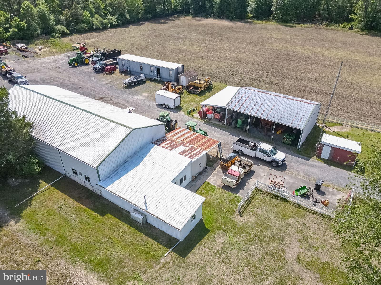 329 Lakedale Road Berlin, NJ 08009 - Photo 45 of 63 an aerial view of a house with swimming pool and patio