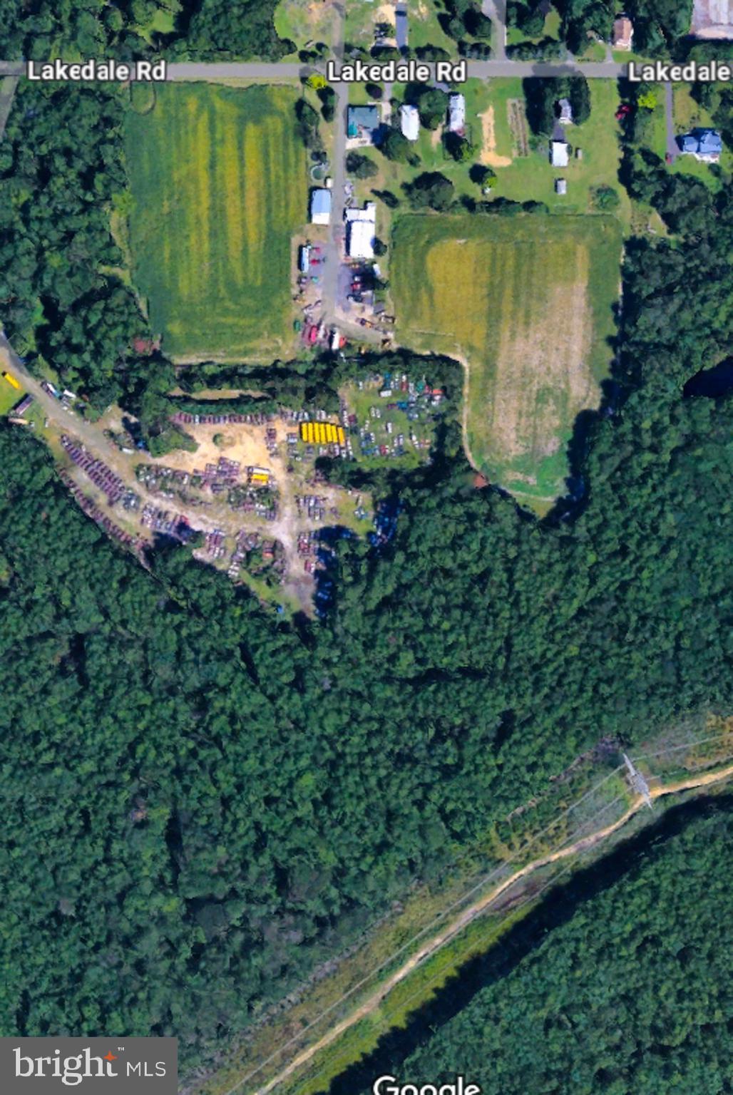 329 Lakedale Road Berlin, NJ 08009 - Photo 49 of 63 an aerial view of a house with a lake view