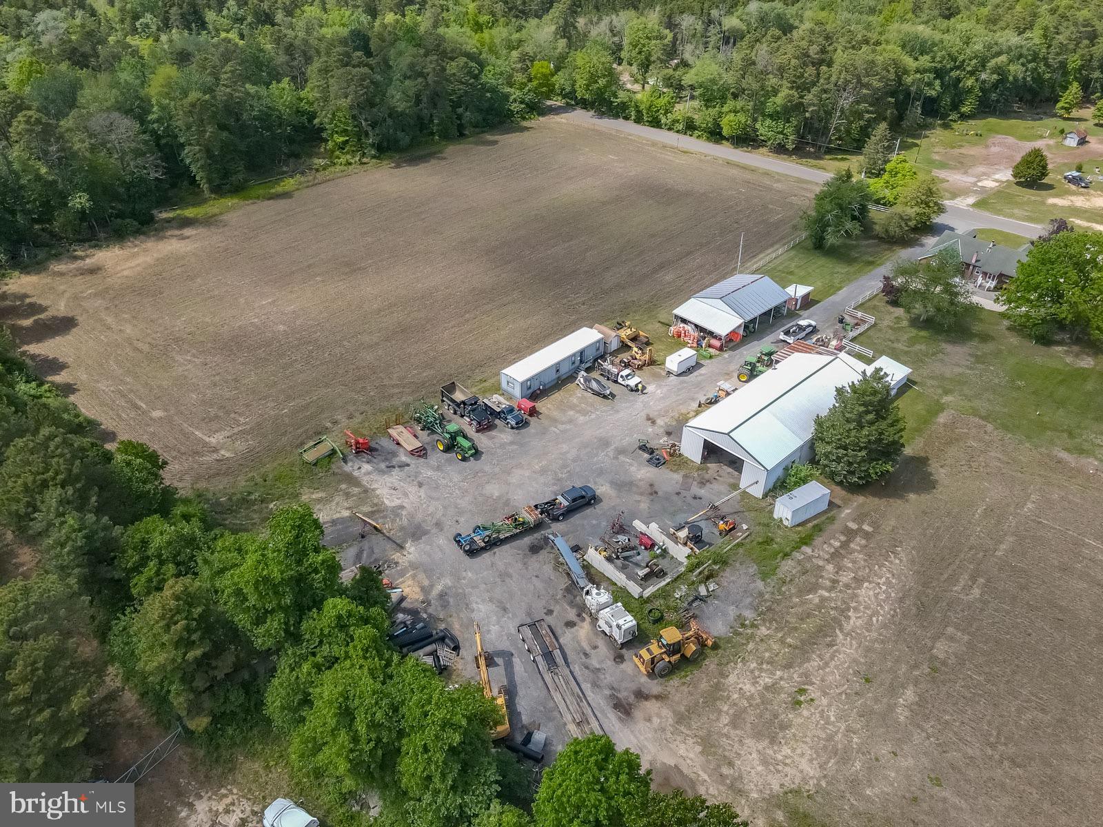 329 Lakedale Road Berlin, NJ 08009 - Photo 5 of 63 an aerial view of a house with a yard