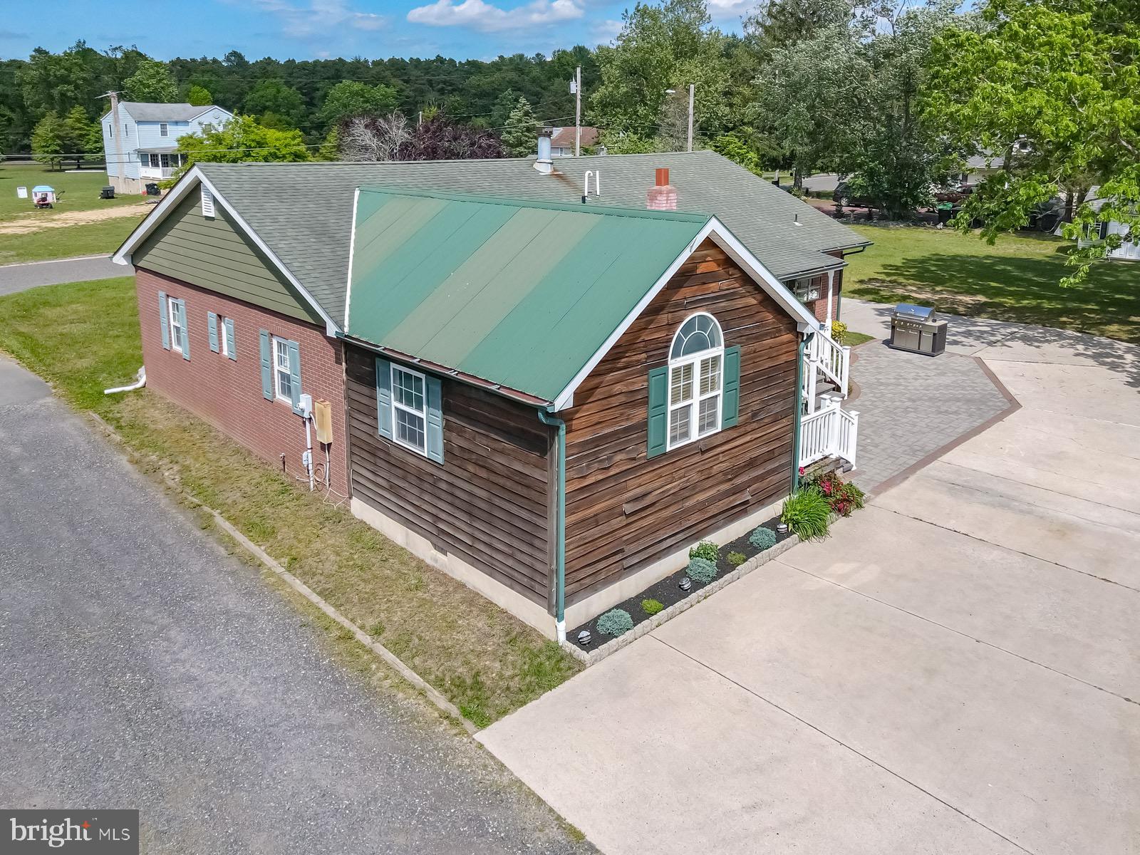 329 Lakedale Road Berlin, NJ 08009 - Photo 54 of 63 a aerial view of a house with a yard