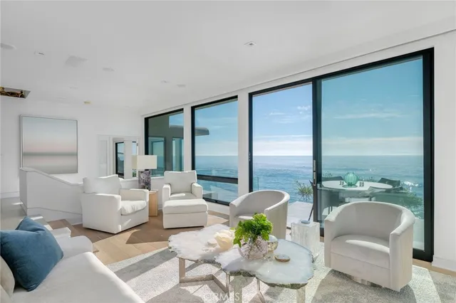 a kitchen with a table and chairs in it