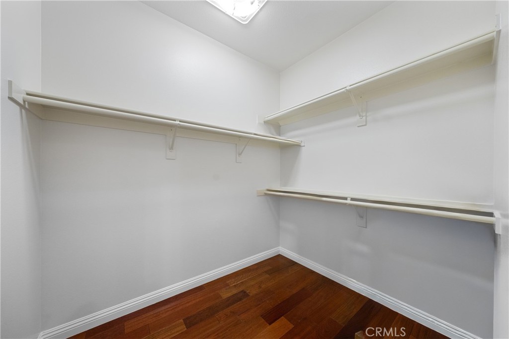 26 Twin Gables Irvine, CA 92620 - Photo 23 of 36 a view of an empty walk in closet
