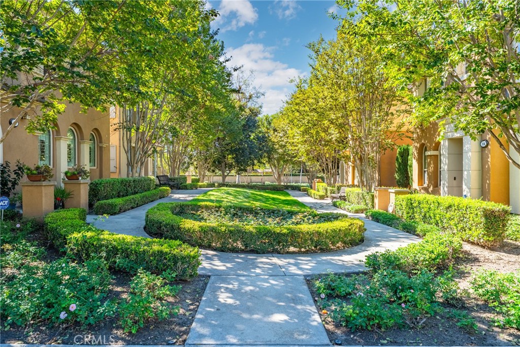 26 Twin Gables Irvine, CA 92620 - Photo 33 of 36 a view of a garden with large trees