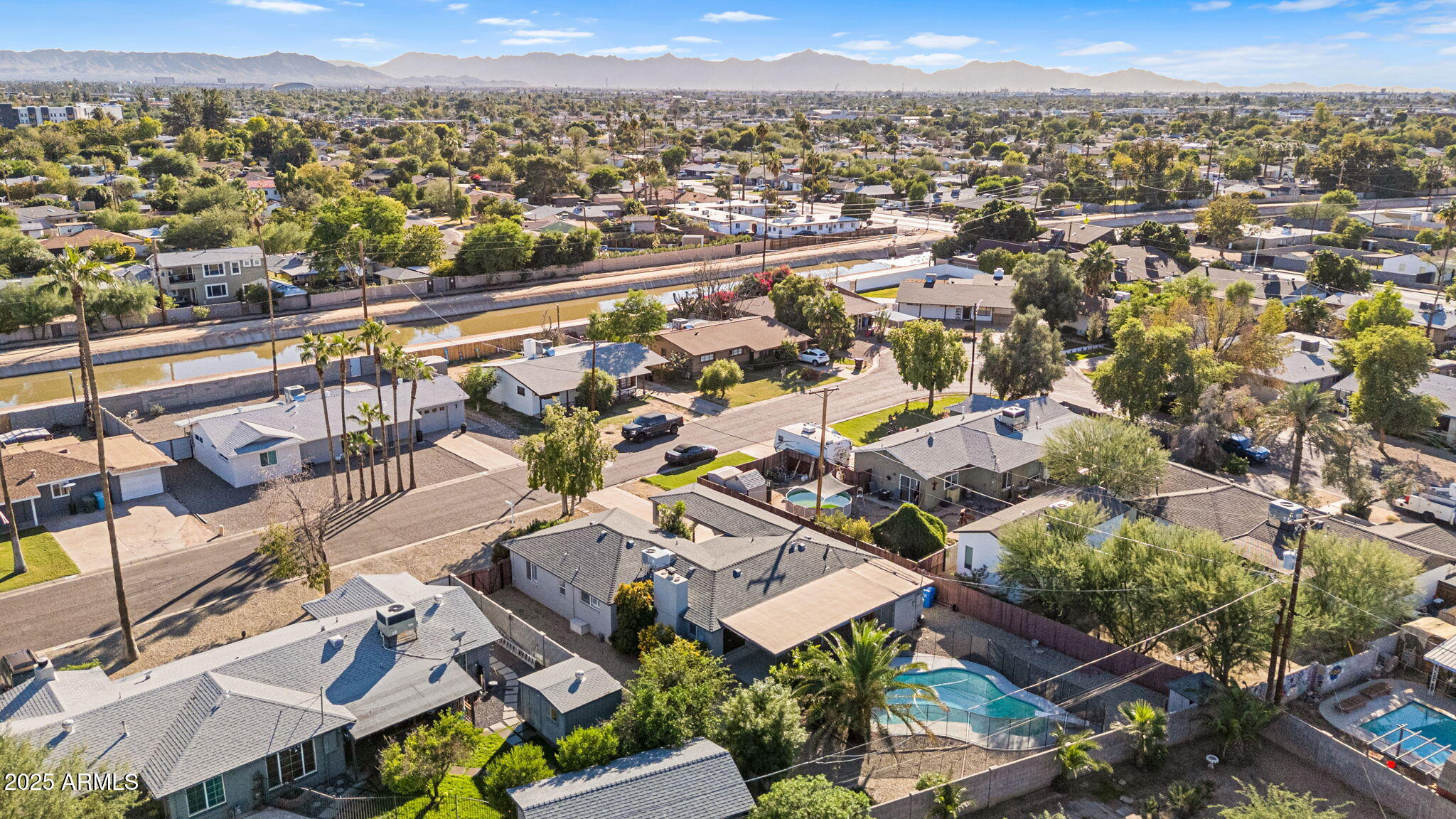 1334 West Sells Drive Phoenix, AZ 85013 - Photo 29 of 32 an aerial view of a city with lots of residential buildings