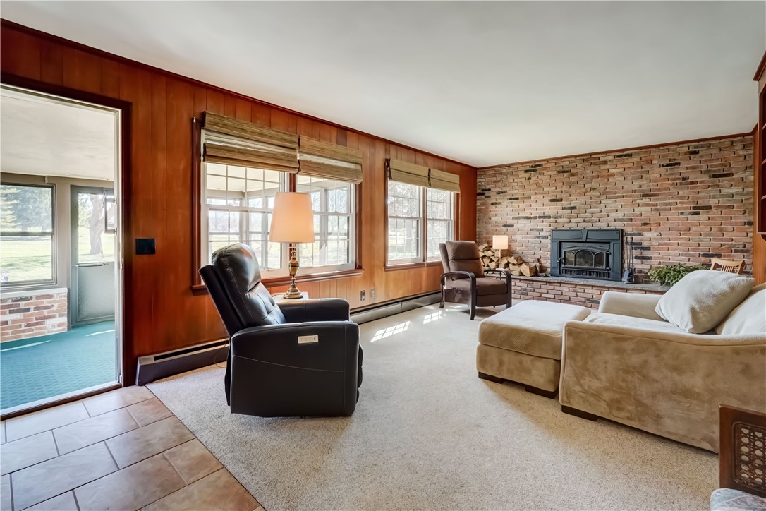 1776 Jackson Road Penfield, NY 14526 - Photo 21 of 50 View looking into the family room with wood burnin