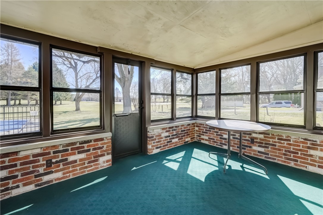 1776 Jackson Road Penfield, NY 14526 - Photo 26 of 50 3-season enclosed porch leading to your private ba