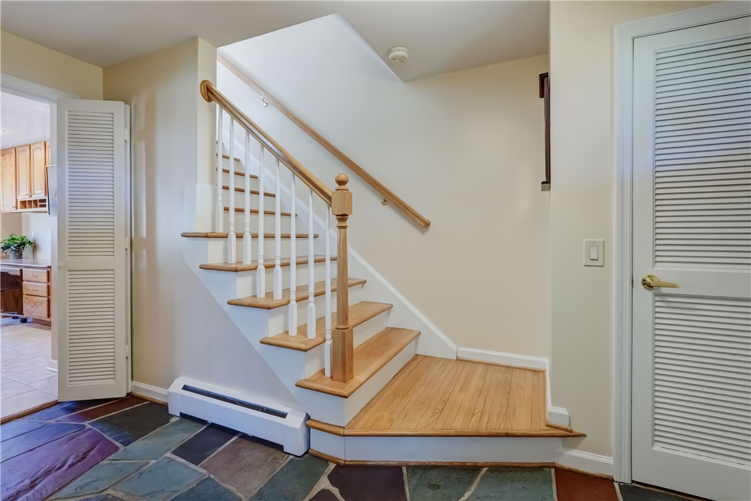 1776 Jackson Road Penfield, NY 14526 - Photo 6 of 50 Off-set staircase system so as not to crowd the fr