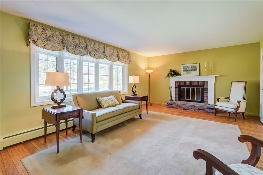1776 Jackson Road Penfield, NY 14526 - Photo 7 of 50 Expansive formal living room with 5-pane bow windo