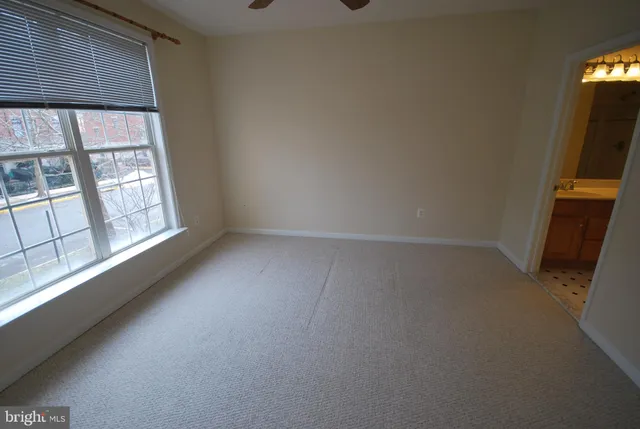 en empty room with windows