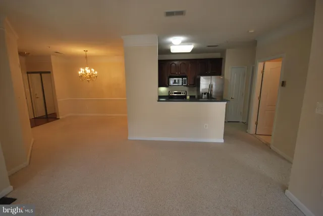 a view of a kitchen with a sink