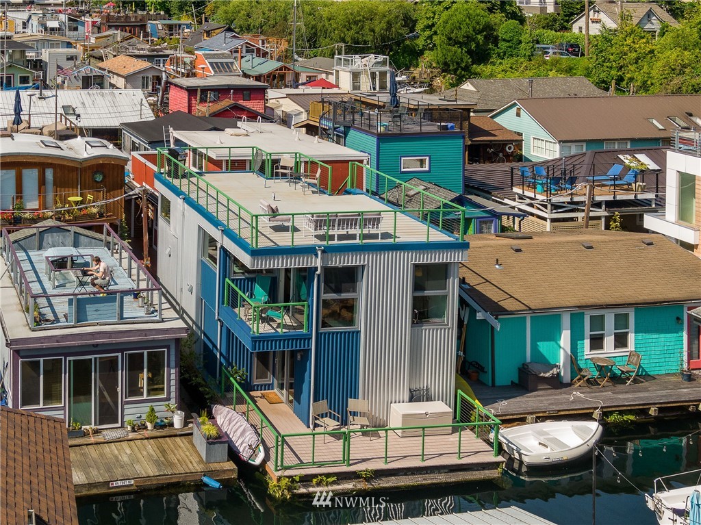 2031 Fairview Avenue East, Unit E Seattle, WA 98102 - Photo 1 of 32 a view of multiple houses with a fountain