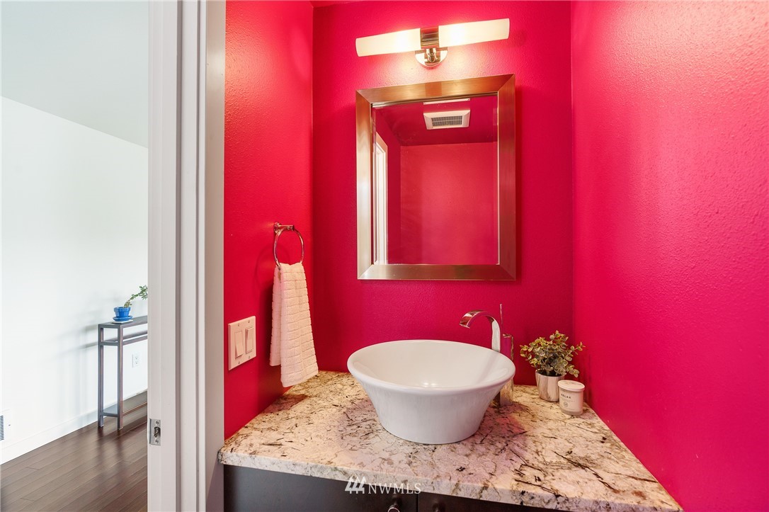 2031 Fairview Avenue East, Unit E Seattle, WA 98102 - Photo 12 of 32 a view of a room with a potted plant and a sink