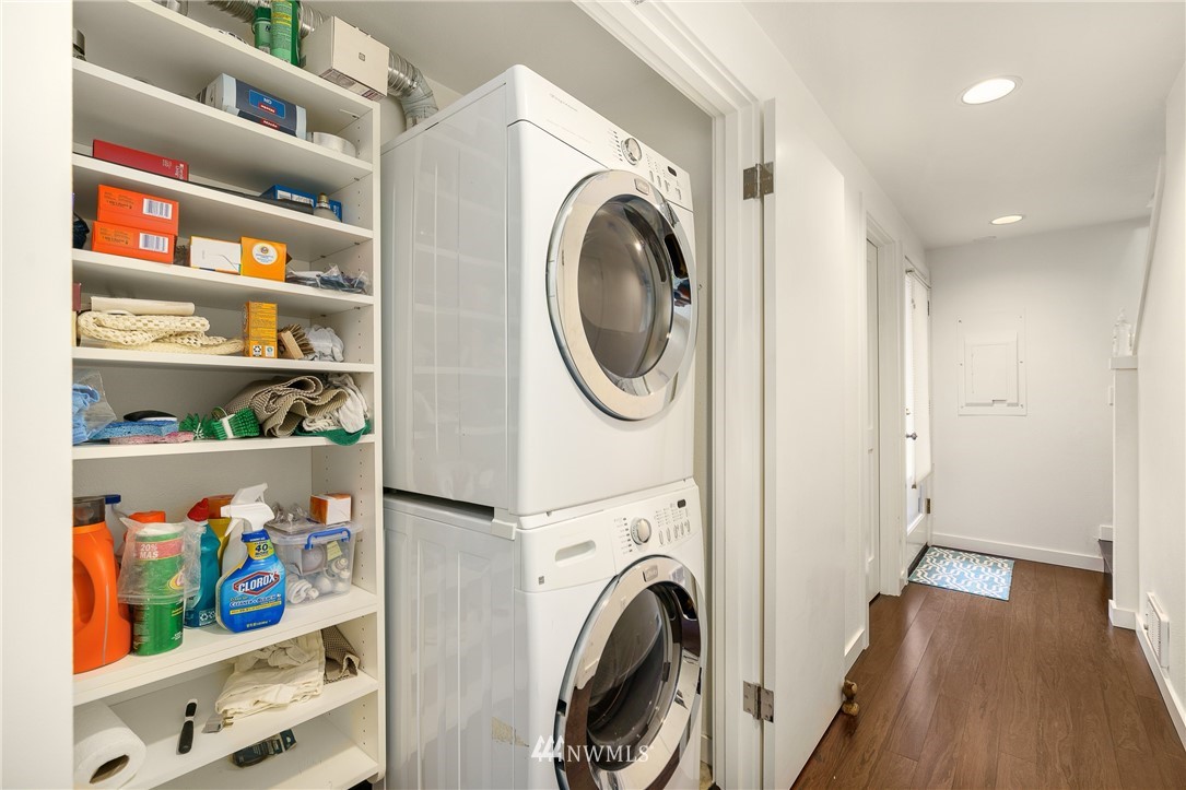 2031 Fairview Avenue East, Unit E Seattle, WA 98102 - Photo 22 of 32 a view of a bedroom with washer and dryer