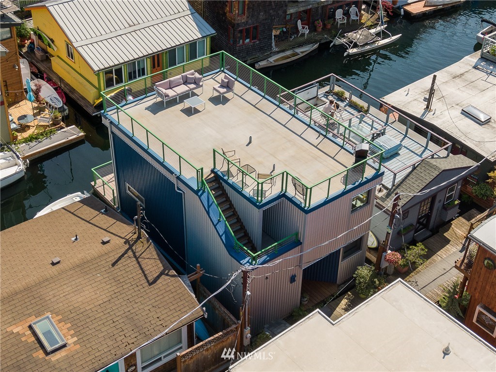 2031 Fairview Avenue East, Unit E Seattle, WA 98102 - Photo 24 of 32 an aerial view of a house with a ocean view