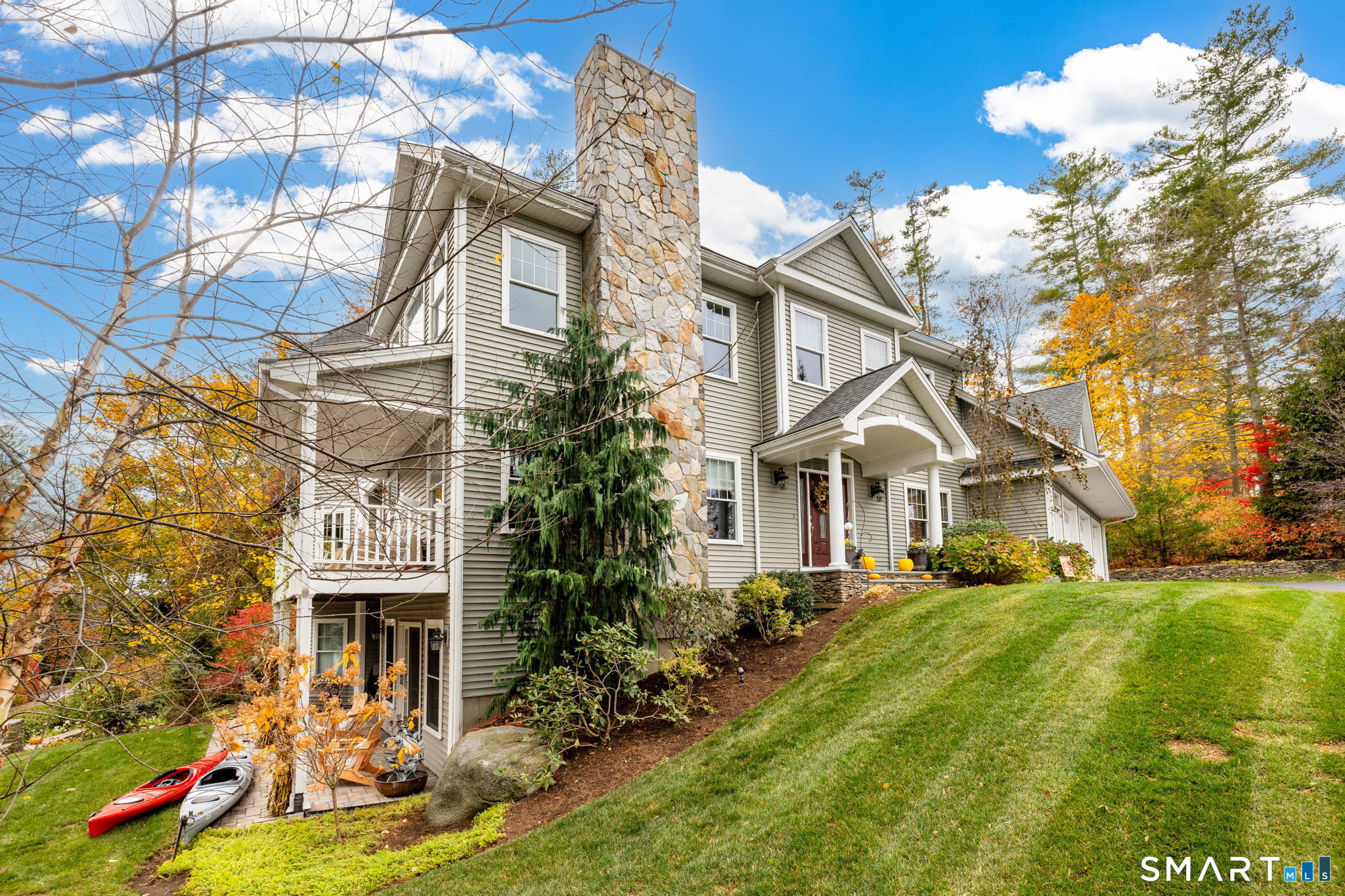7 Hill Top Road Morris, CT 06763 - Photo 1 of 43 a front view of a house with garden