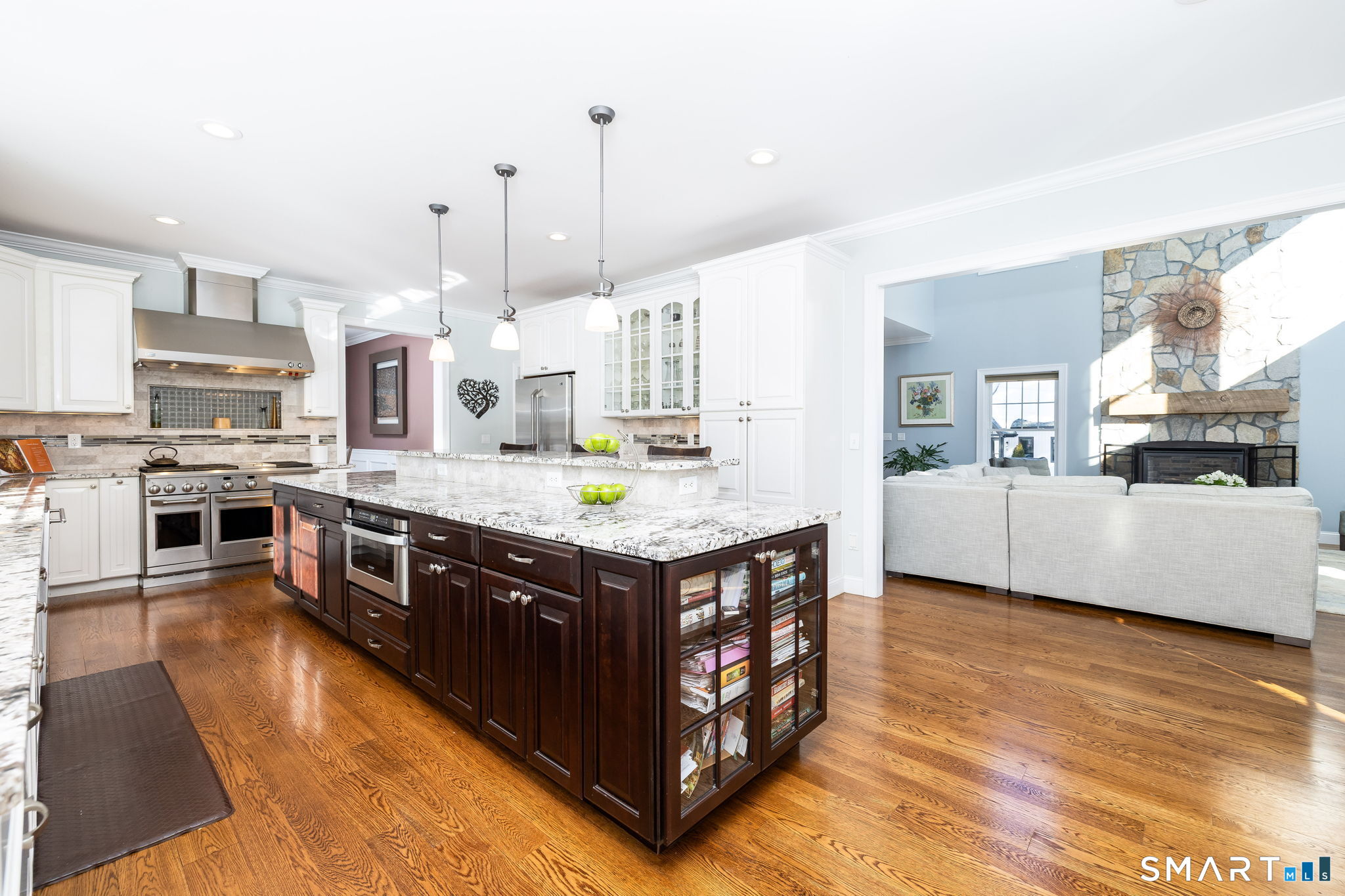 7 Hill Top Road Morris, CT 06763 - Photo 13 of 43 a kitchen with stainless steel appliances granite countertop a stove a sink dishwasher a refrigerator and a oven with wooden floor