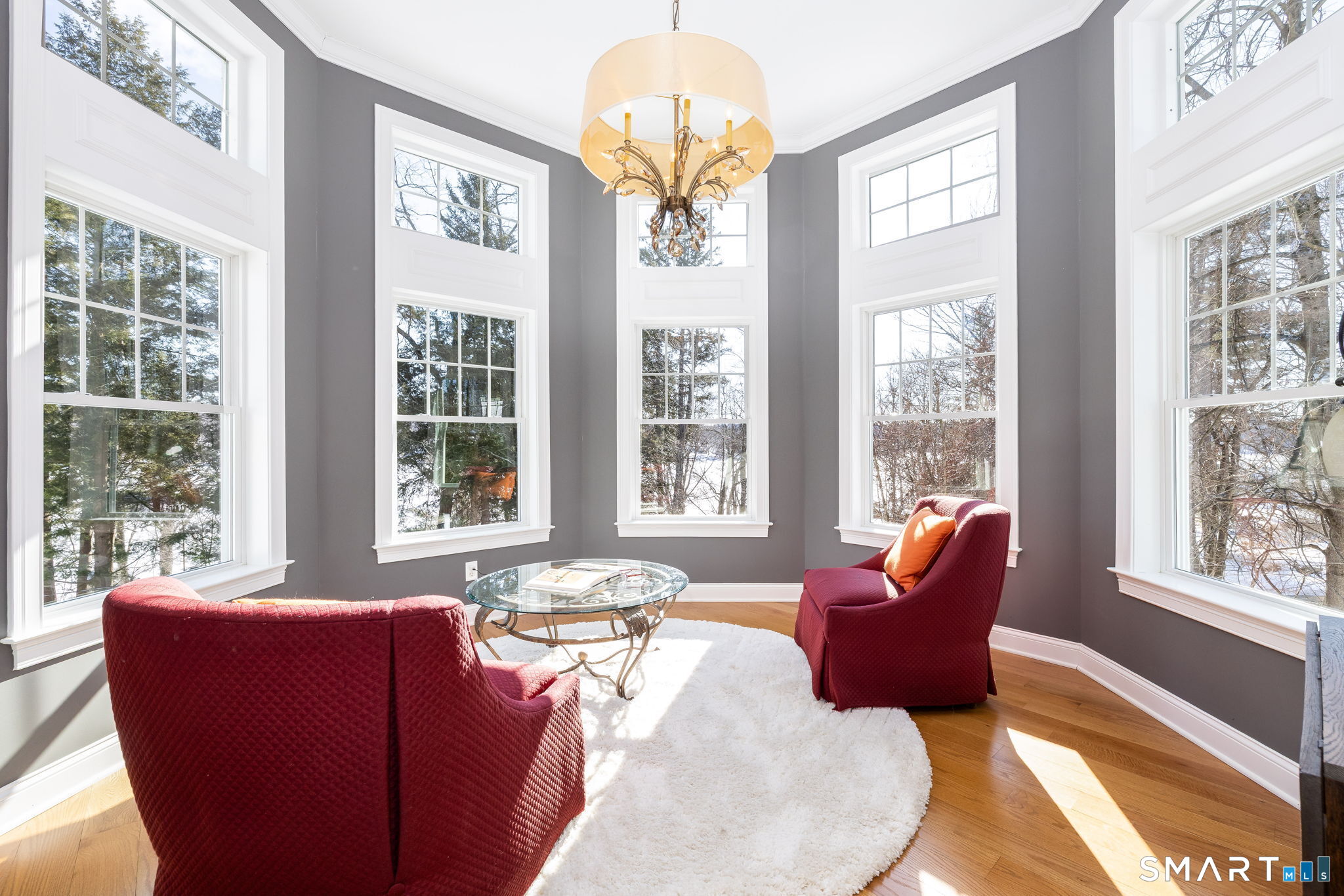 7 Hill Top Road Morris, CT 06763 - Photo 17 of 43 a living room with furniture and a large window