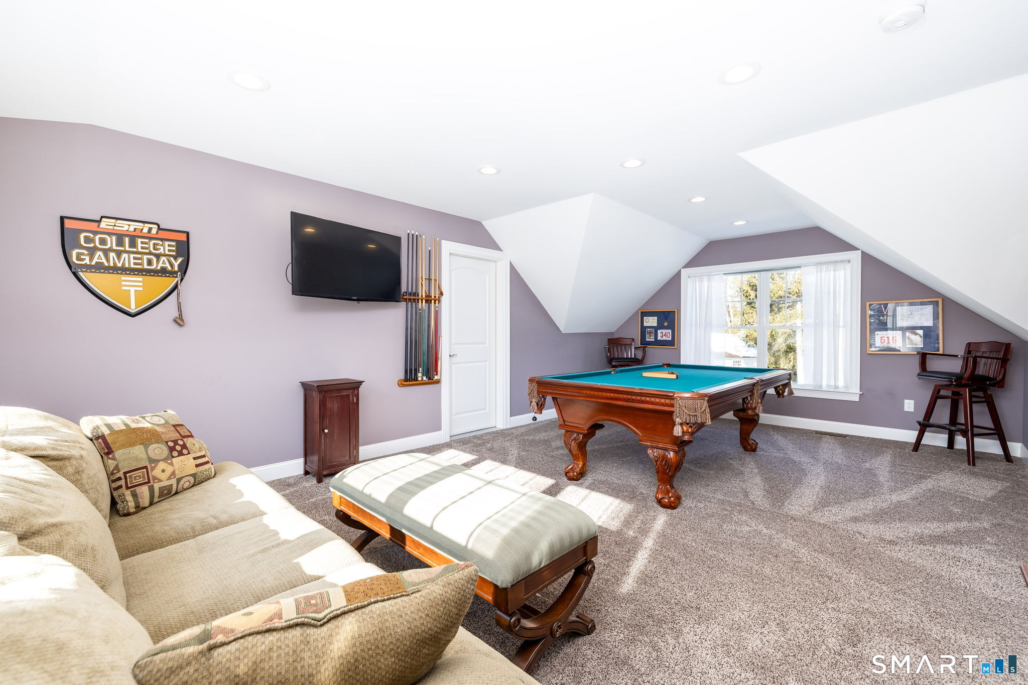 7 Hill Top Road Morris, CT 06763 - Photo 23 of 43 a living room with furniture and a flat screen tv