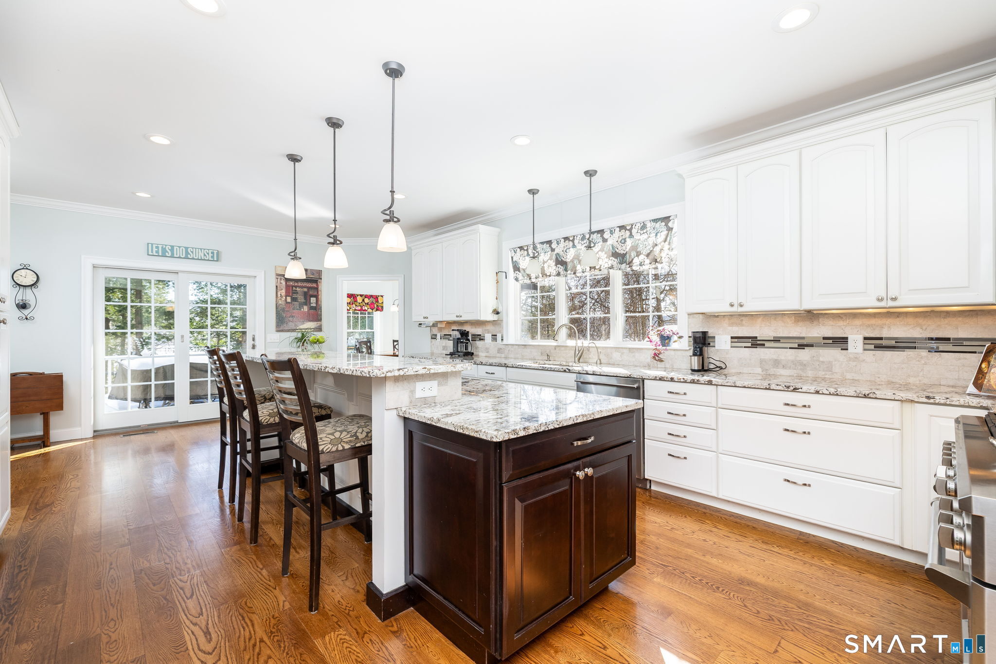 7 Hill Top Road Morris, CT 06763 - Photo 10 of 43 a kitchen with stainless steel appliances granite countertop a stove and a wooden floors