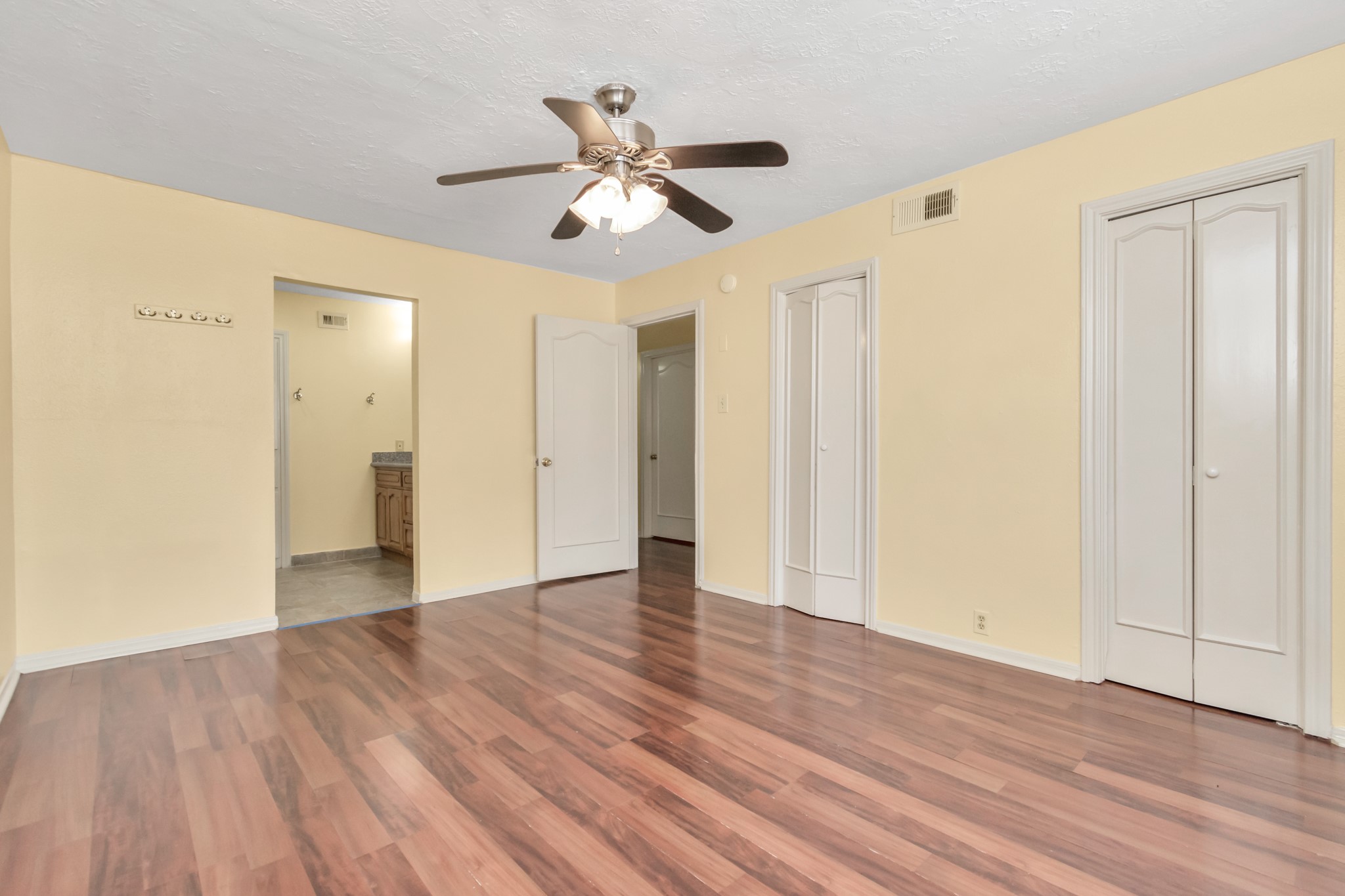 4702 Cashel Circle, Unit B Houston, TX 77069 - Photo 15 of 34 a view of an empty room with wooden floor