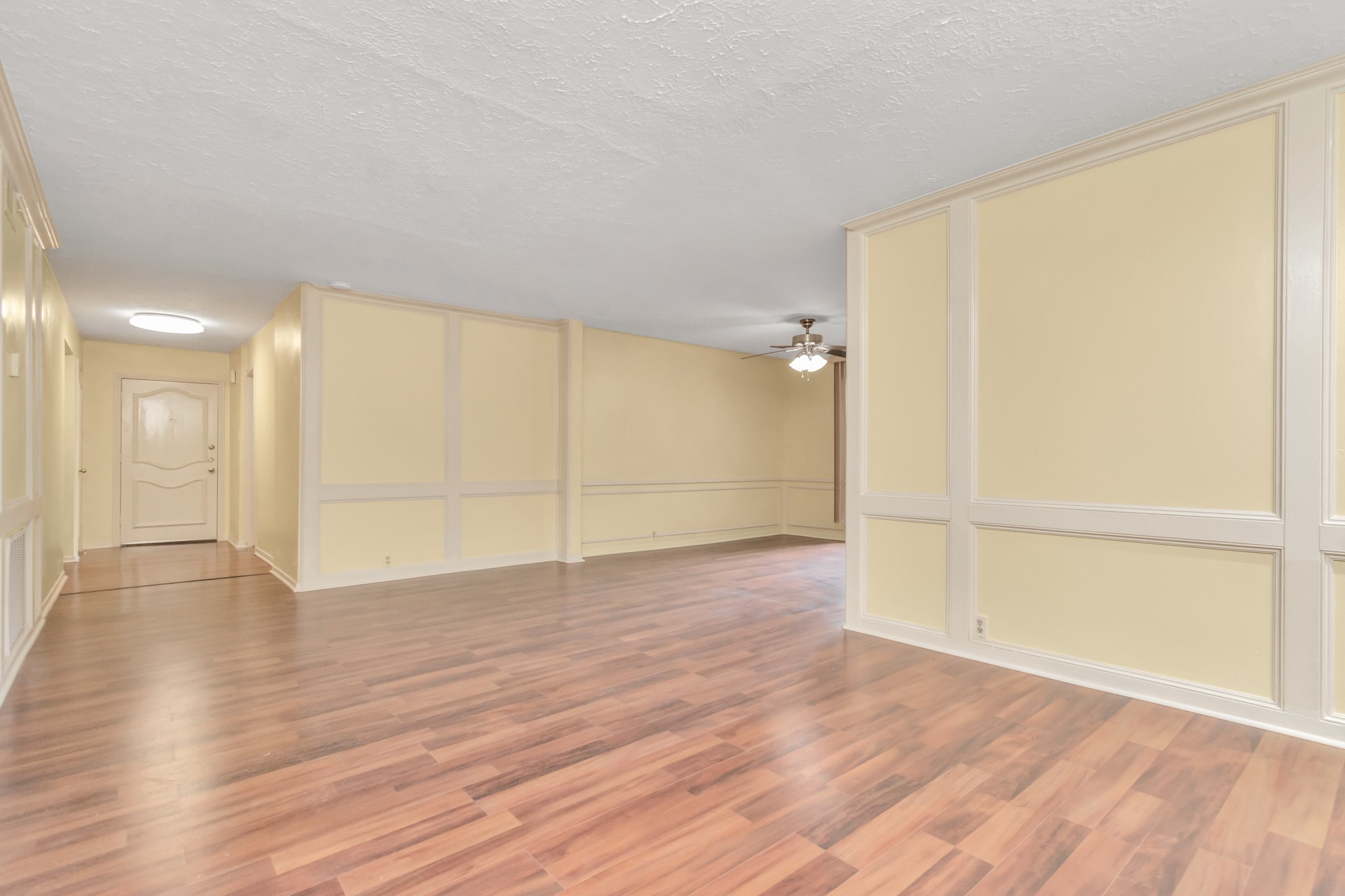 4702 Cashel Circle, Unit B Houston, TX 77069 - Photo 24 of 34 wooden floor in an empty room with a window