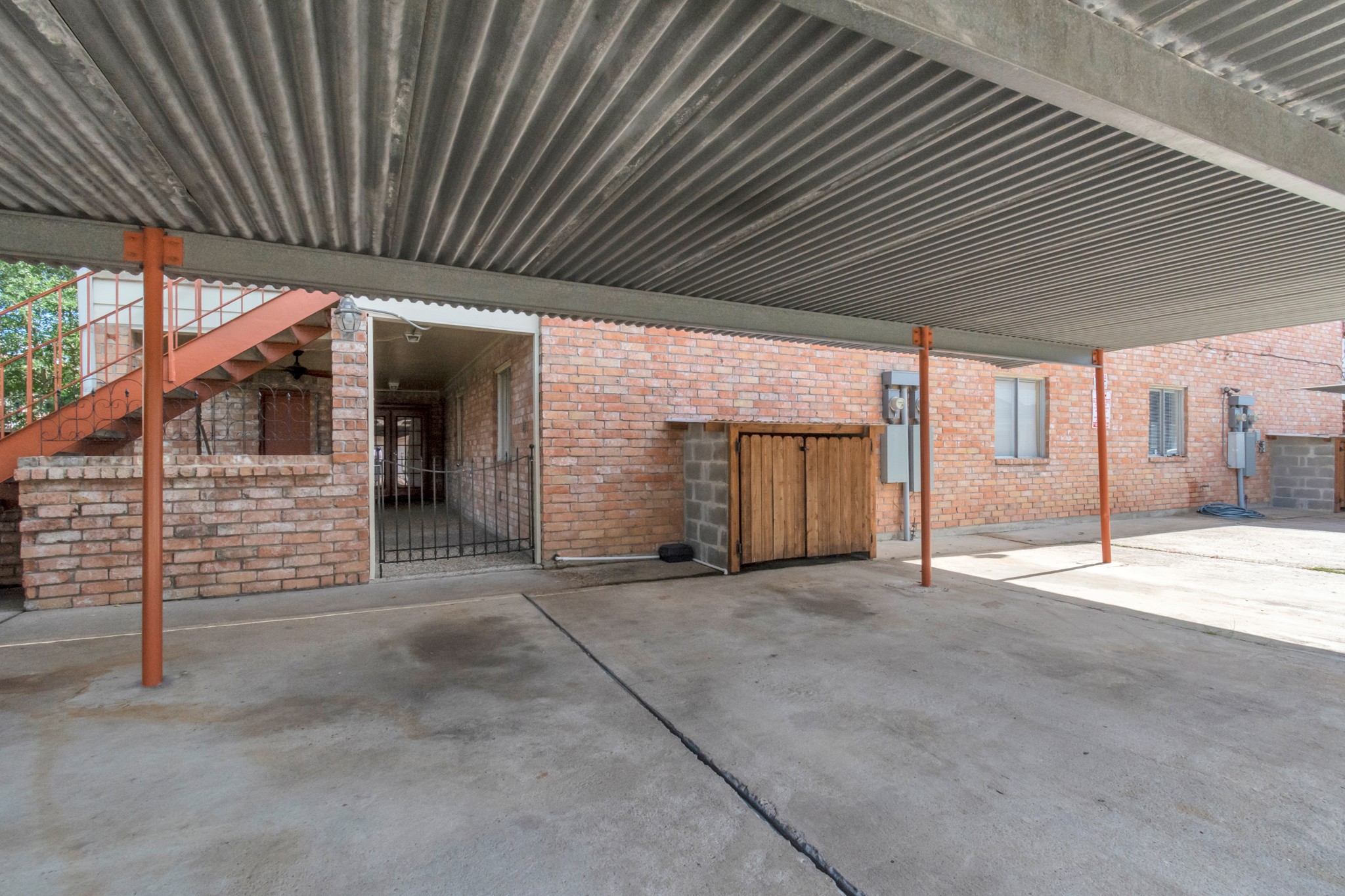 4702 Cashel Circle, Unit B Houston, TX 77069 - Photo 34 of 34 a view of an empty room with wooden roof and gate