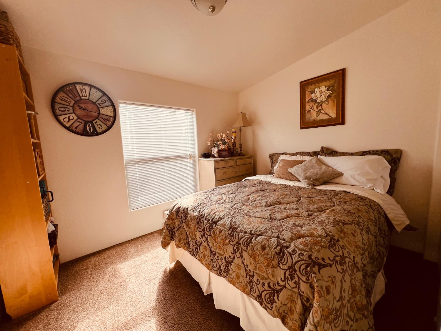 195 Schooner Lane Modesto, CA 95356 - Photo 14 of 24 a bedroom with a bed and a window