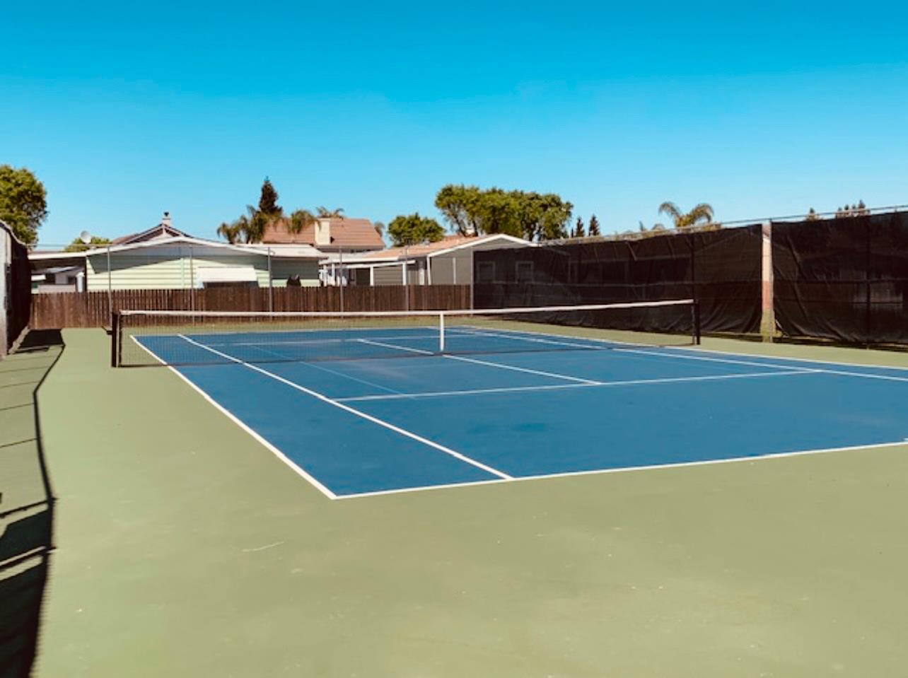 195 Schooner Lane Modesto, CA 95356 - Photo 24 of 24 a view of a tennis court