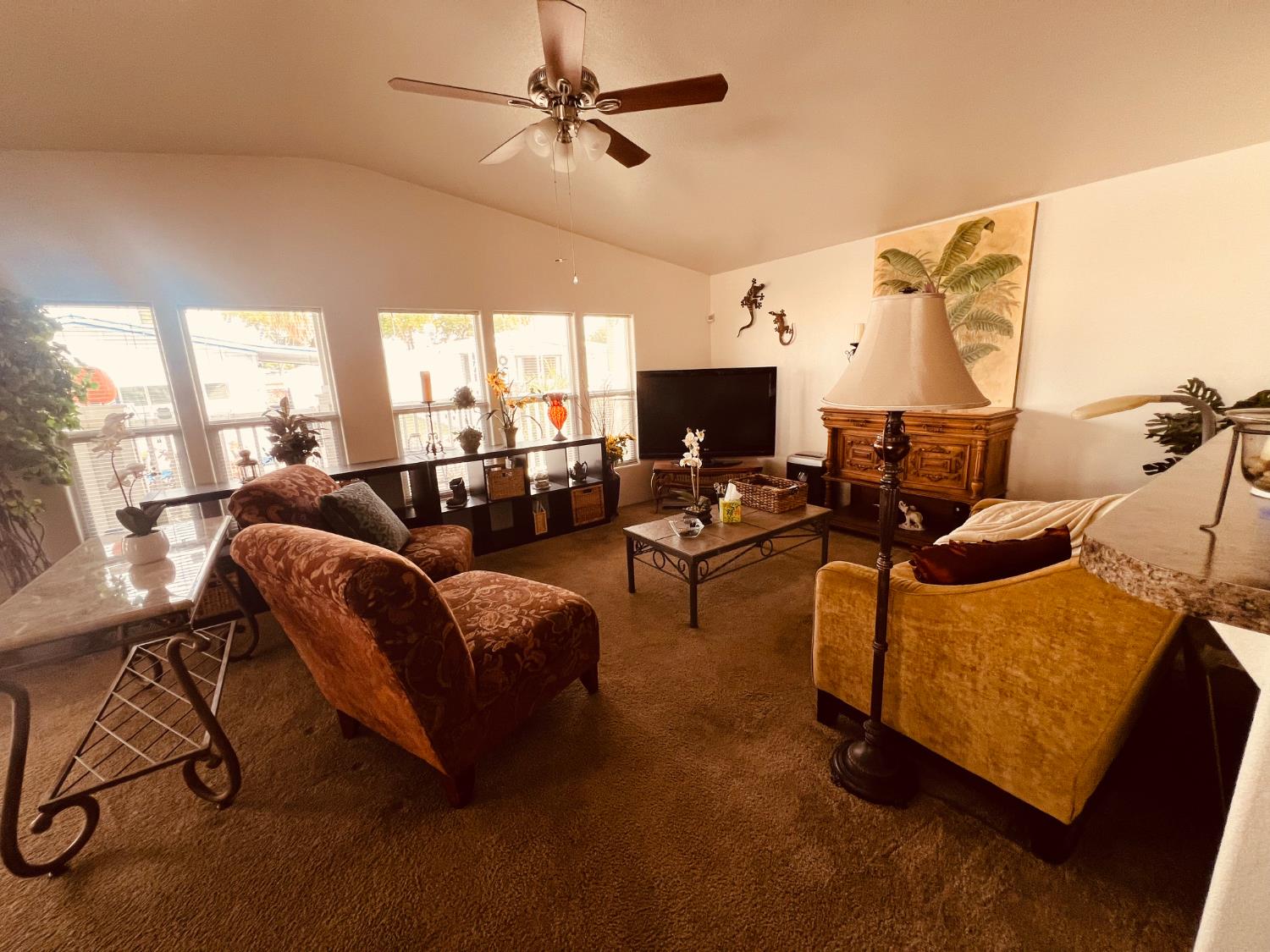 195 Schooner Lane Modesto, CA 95356 - Photo 4 of 24 a living room with furniture and a flat screen tv