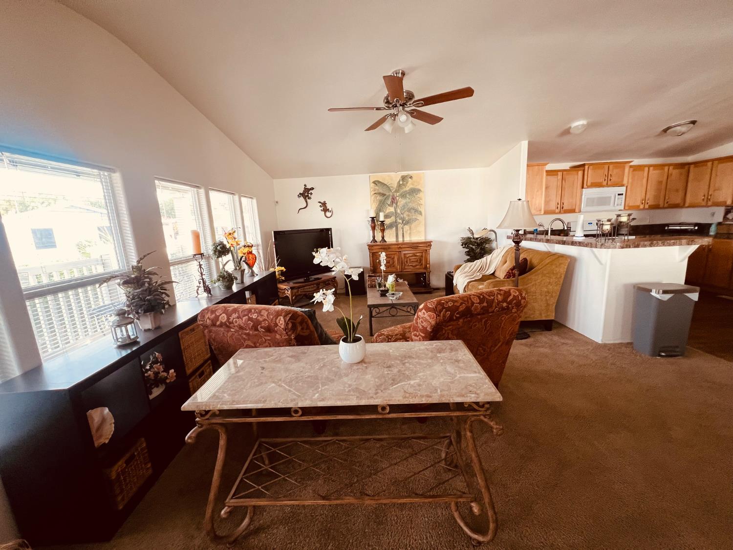 195 Schooner Lane Modesto, CA 95356 - Photo 8 of 24 a living room with furniture and a large window