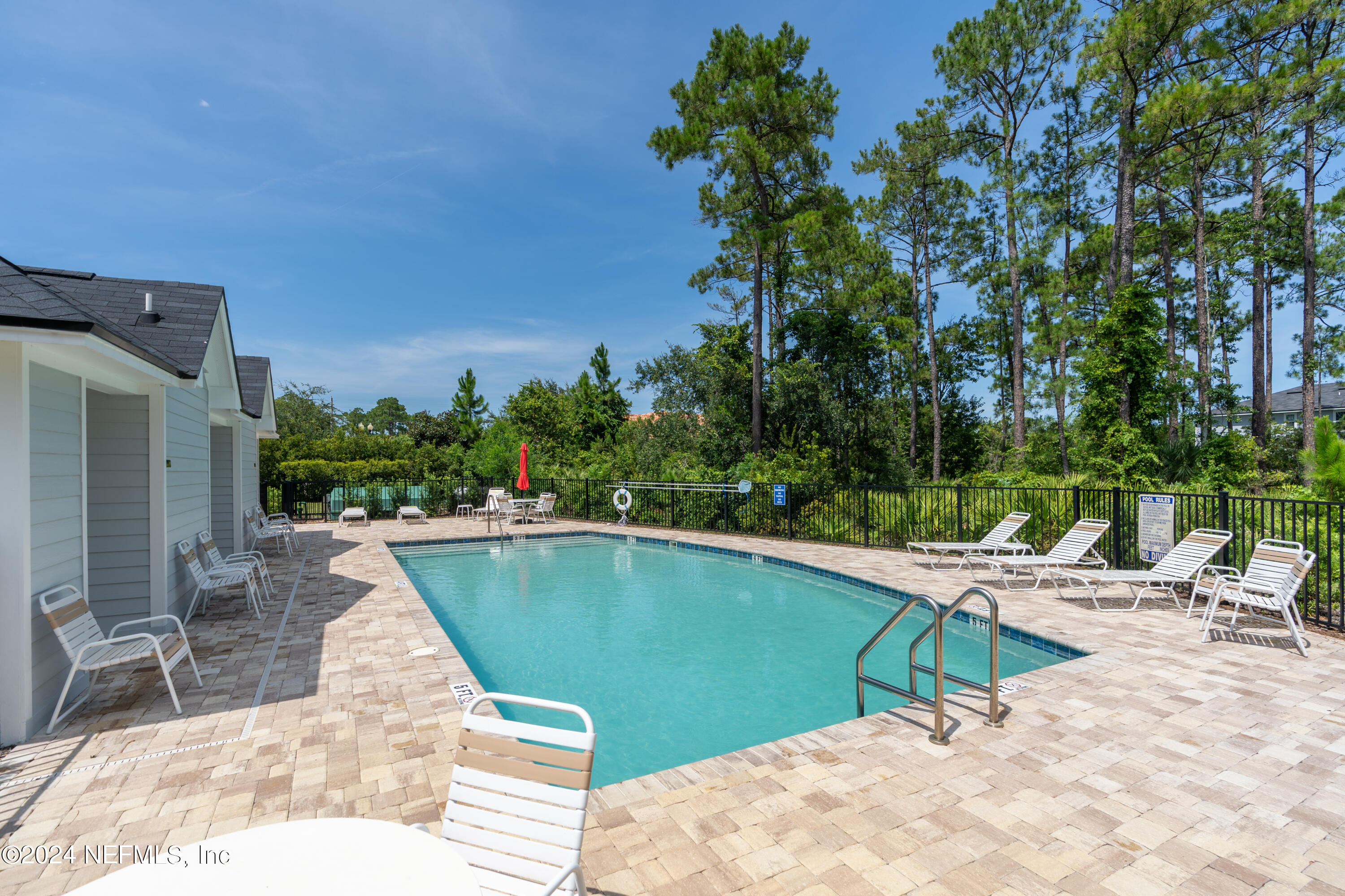 49 Ridge Lake Road St. Augustine, FL 32086 - Photo 35 of 37 a view of swimming pool with outdoor seating and plants