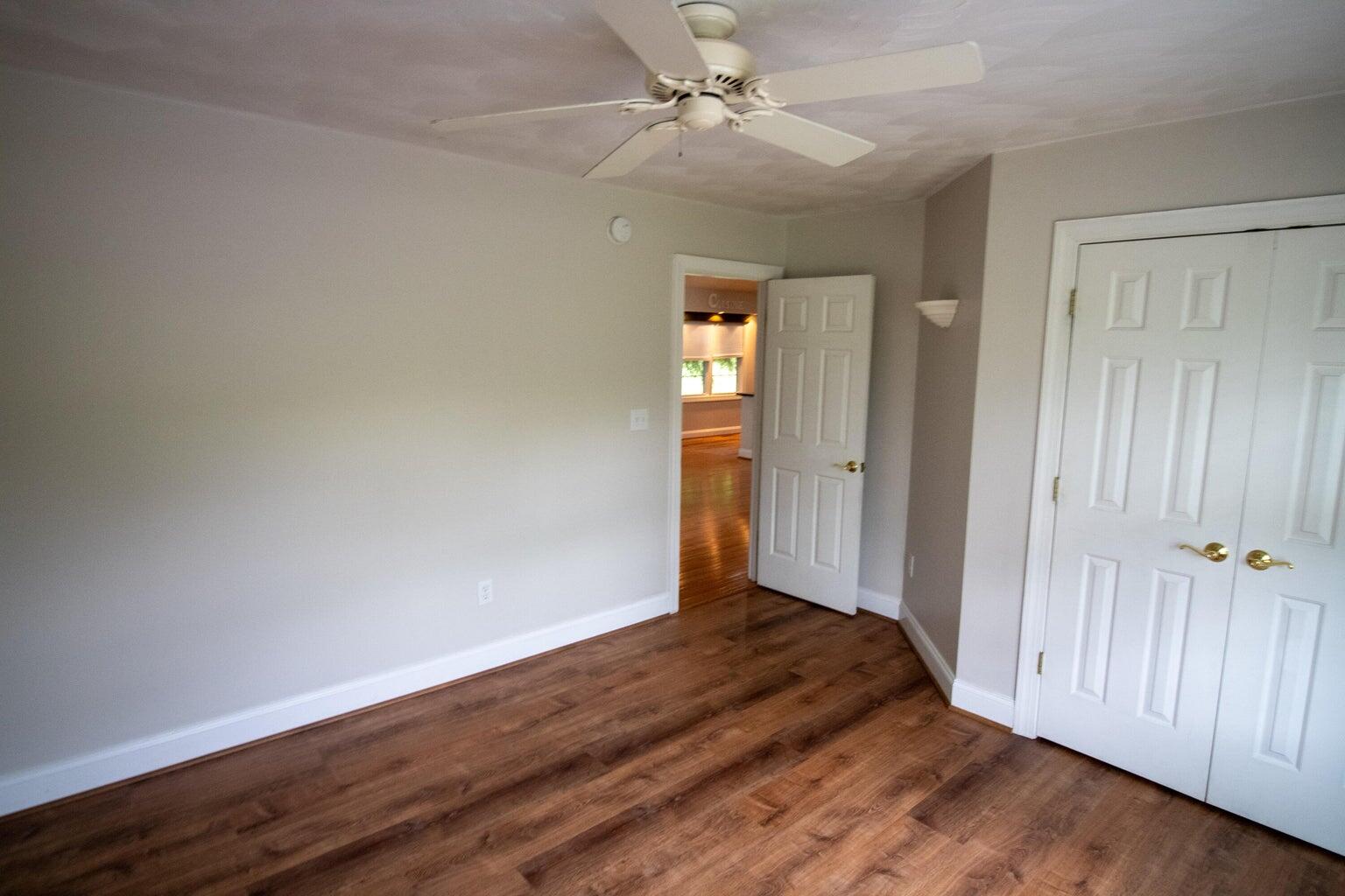 3727 Chaparral Drive Roanoke, VA 24018 - Photo 11 of 24 an empty room with wooden floor ceiling fan