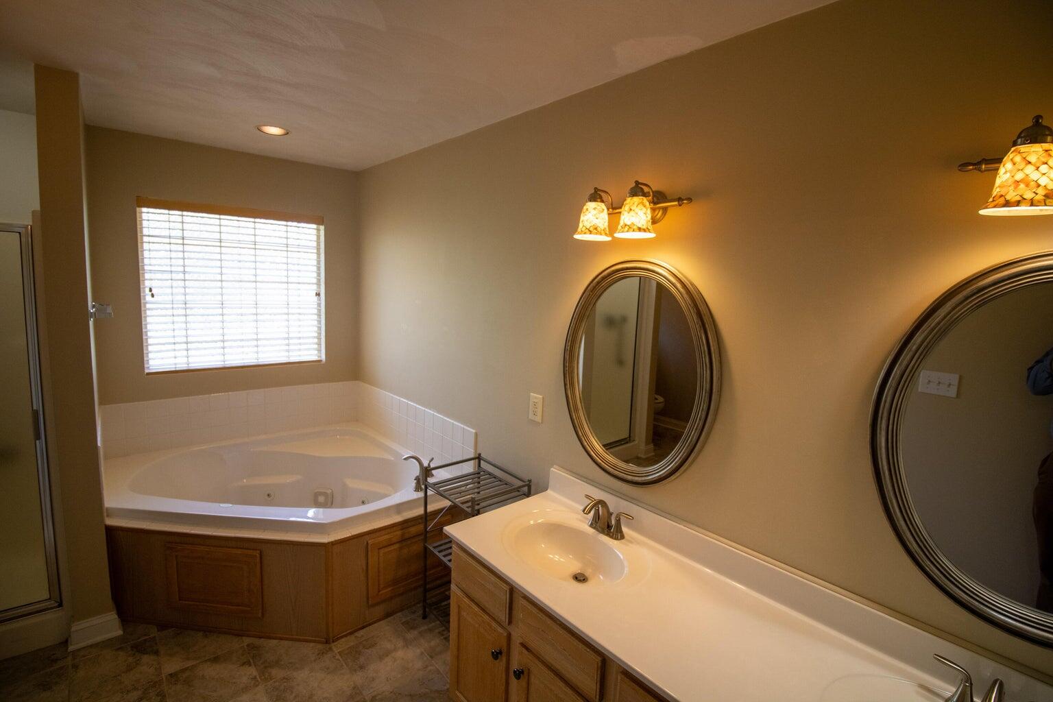 3727 Chaparral Drive Roanoke, VA 24018 - Photo 13 of 24 a bathroom with a sink and a mirror
