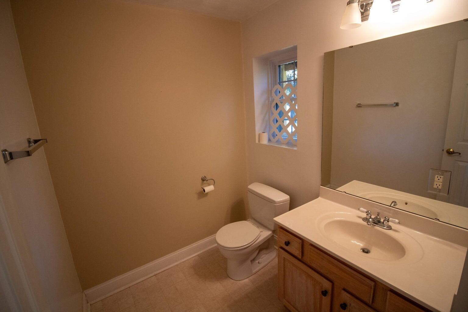 3727 Chaparral Drive Roanoke, VA 24018 - Photo 19 of 24 a bathroom with a sink toilet and mirror