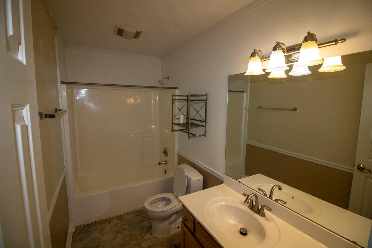 3727 Chaparral Drive Roanoke, VA 24018 - Photo 9 of 24 a bathroom with a sink toilet and shower