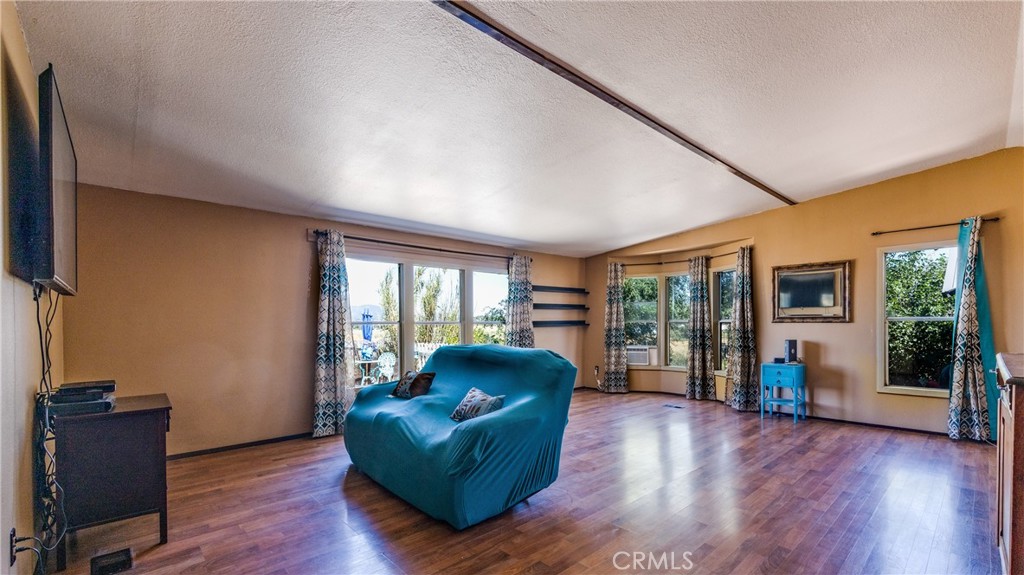 39550 Kirby Road Anza, CA 92539 - Photo 11 of 53 a living room with furniture and a large window