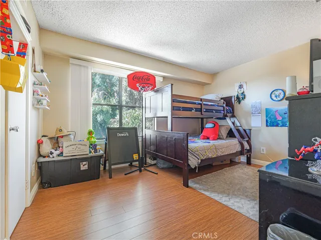 a bedroom with a workspace