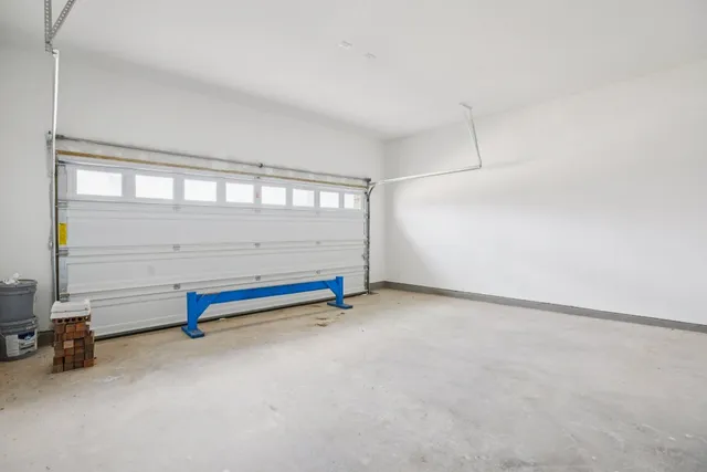 a view of a house with backyard and porch